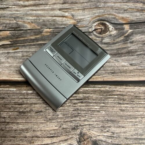 Radio-controllend travel clock (The Sharper image)