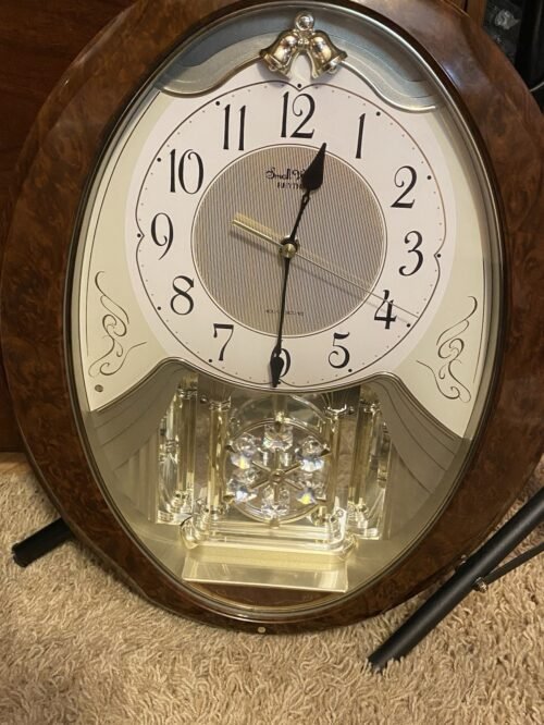 Rhythm Small World Clock with Melodies &Crystal Snowflake Pendulum