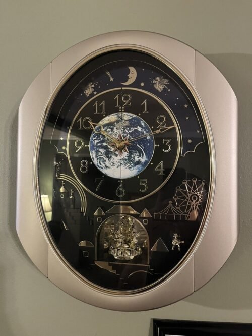 Rhythm Small World Peaceful Cosmos Musical Motion Wall Clock