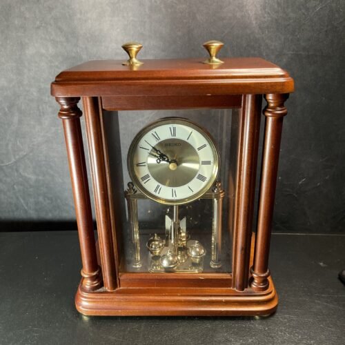 Seiko QXG332BLH Rotating Pendulum Wooden Carriage Mantel ClockModel: QXG332BLH