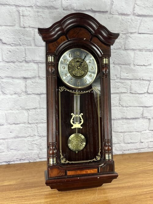 Seiko Stately Dark Brown Solid Oak Case Wall Clock with Pendulum and Dual Chimes