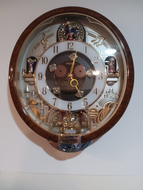 Seiko Swarovski Crystals 8 classic Melodies in Motion oval Wall Clock QXM147BRH
