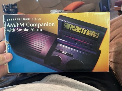 Sharper Image AM/fm Companion with Smoke Alarm Brand New Open Box