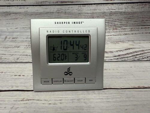 Sharper Image Atomic Travel Alarm Clock with Green Backlit LCD Display