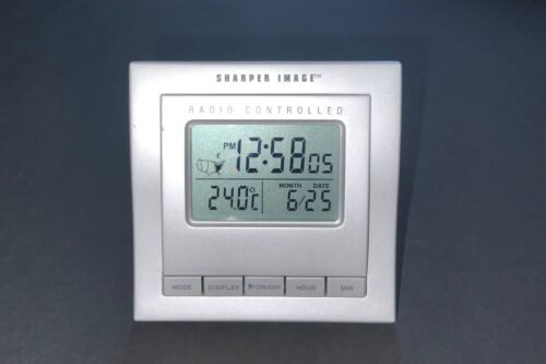 Sharper Image Atomic Travel Alarm Clock with Green Backlit LCD Display