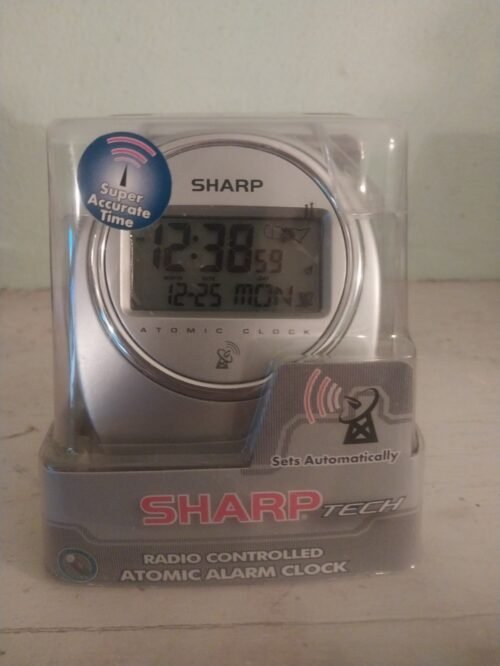 Sharp radio-controlled atomic alarm clock with LCD display (SPC364) NOS