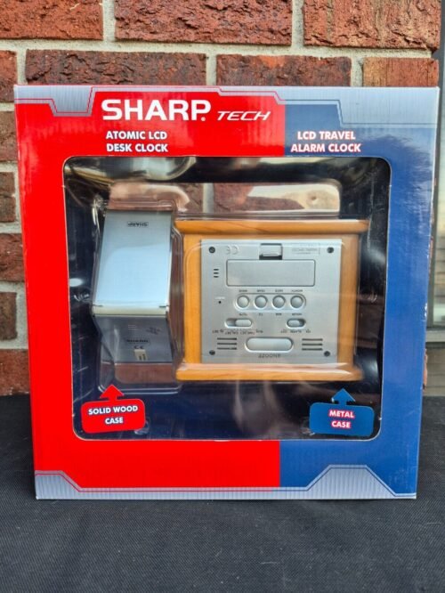 Sharp Tech Atomic LCD Desk Clock & LCD Travel Alarm Clock SPC324SC New in Box.