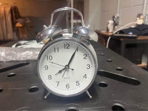 Silver alarm clock