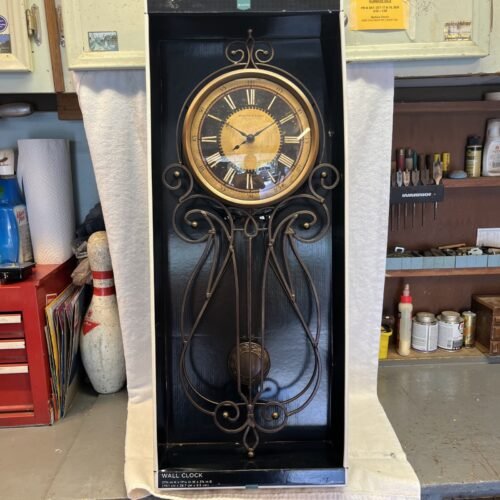 STERLING NOBLE PENDULUM WROUGHT IRON WALL CLOCK