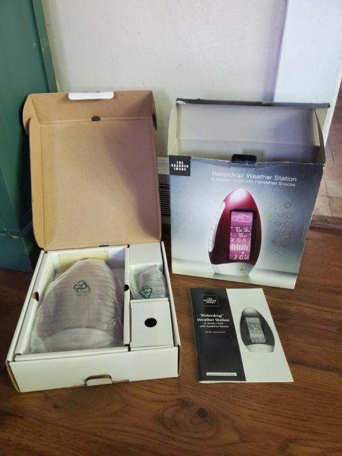 The Sharper Image Waterdrop Weather Station & Atomic Clock Red Open Box