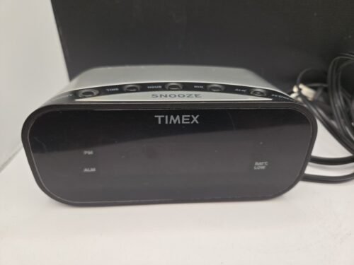 Timex T121 LED display alarm clock. Battery back-up, travel alarm, measures 5.5"