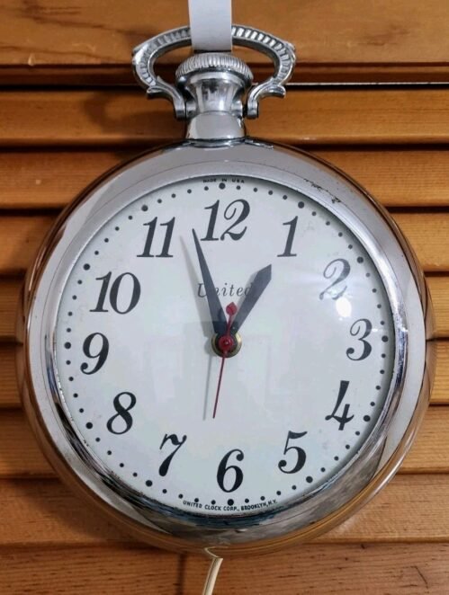 United Clock Corp NY Pocket Watch Style Wall Mounted Clock/ Working Condition