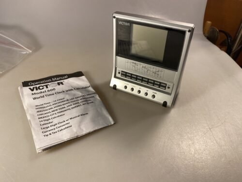 Victor Model 600 World Time Travel Clock W/ Alarm, Calendar, Calculator & Manual
