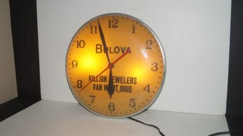 Vintage BULOVA Lighted KILLION JEWELERS VAN WERT OHIO Wall Clock w/ Glass Front