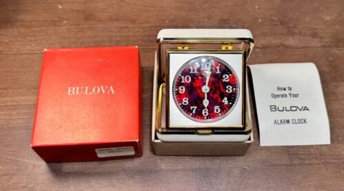 Vintage BULOVA Red marble faced Awake Series (B6133) Wind Up Travel Alarm Clock
