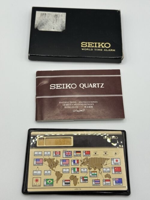 VINTAGE DIGITAL SEIKO WORLD TIMER TIME ZONE TRAVEL ALARM CLOCK POCKET CARD