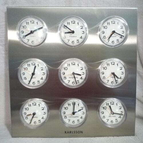 VINTAGE KARLSSON STAINLESS STEEL ANALOGUE WALL CLOCK with 9 CLOCKS/TIME ZONES