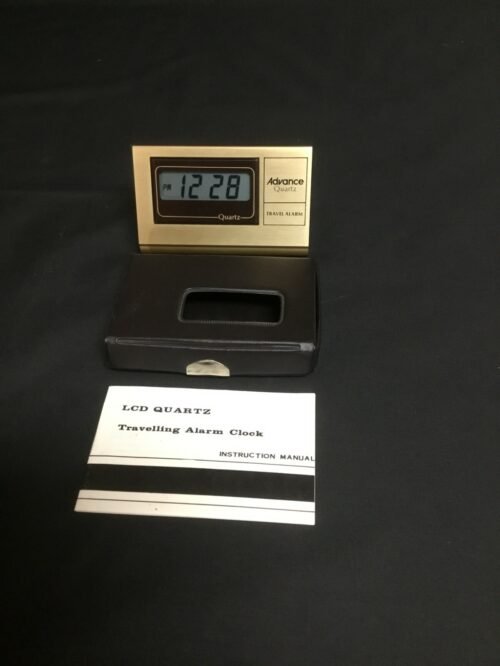 Vintage LCD Quartz Traveling Alarm Clock With Manual and New Battery