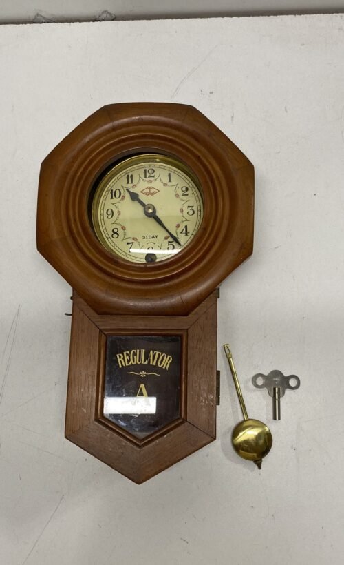 Vintage Regulator A Wall Clock. 12. inch Tall 31 Day - 2 Way Pendulum Clock.