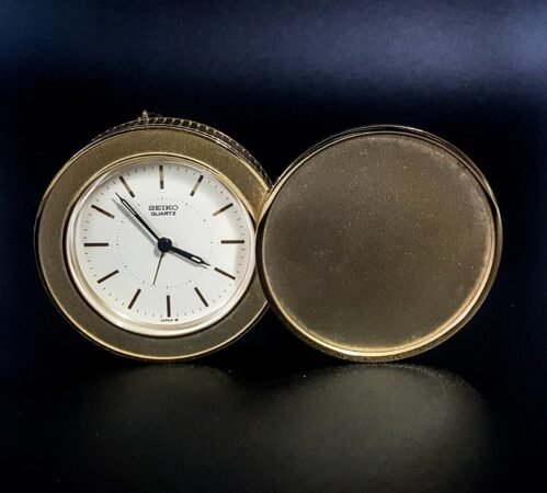 Vintage SEIKO Quartz Travel Clock Gold Tone Swivel Open 2.75" Puck Japan Mvmt
