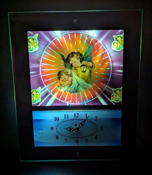 Vintage Spinning Psychedelic Motion Light Angel Mirrored Wall Clock