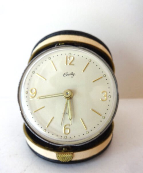 VTG BRADLEY TRAVEL ALARM CLOCK CLAM SHELL FOLD UP GERMANY ROUND FACE WINDS TICKS