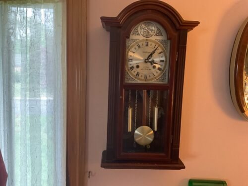 Waltham Vintage Wall Clock. Good working condition. Has key and instruction book
